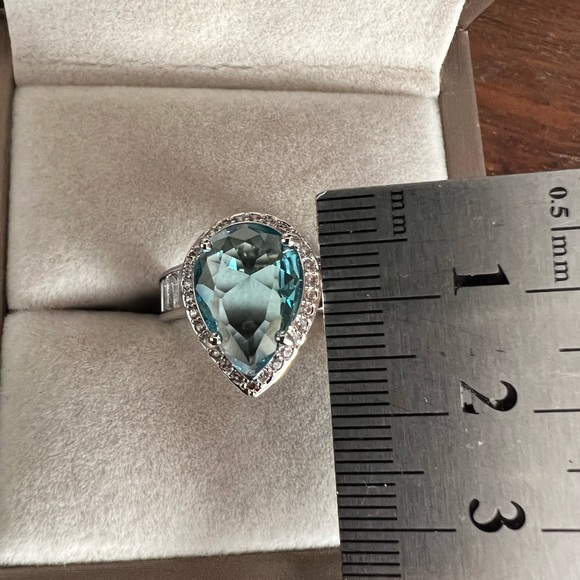 Jewelry - 14k gold finish silver ring with London light blue topaz stone